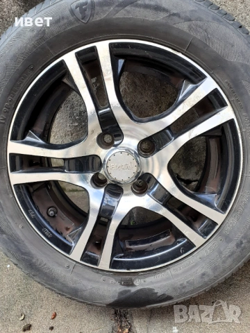 Алуминиеви джанти за Honda Jazz 2005, снимка 2 - Гуми и джанти - 54243273