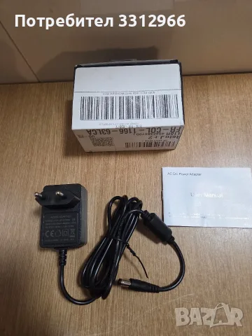 Захранващ адаптер модел J151-1801000EX с изходно напрежение 18.0V и ток 1.0A