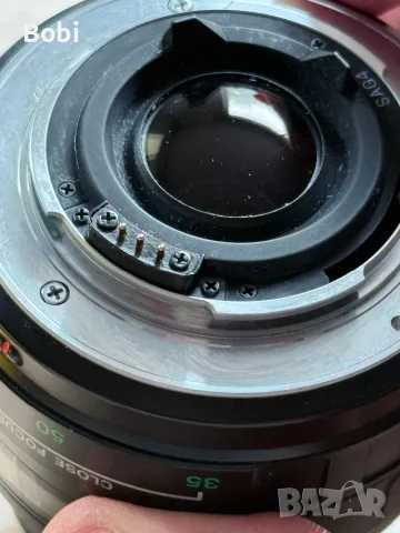 Обектив Olympus AF Zoom 35–70mm f/3.5–4.5 + Cokin UV филтър, снимка 4 - Обективи и филтри - 50324484