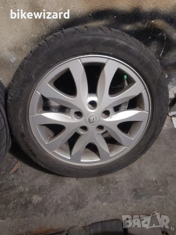 Джанти с летни гуми Firestone 215 50 17 цола 5 х114.3 66.1 централен, снимка 3 - Гуми и джанти - 53102279