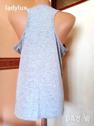 Disney Minnie Mous, Оригинален Потник, Размер L. Код 1694, снимка 10 - Потници - 36540596