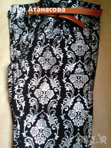Стилен панталон тип клин, изработен от  плътно памучно черно трико