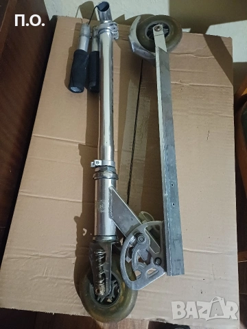 Продавам детска алуминиева тротинетка с амортисьори и спирачка., снимка 2 - Скутери и тротинетки - 53072140