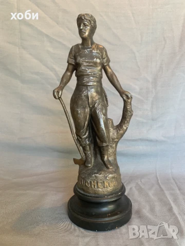 метална фигура дървосекач 