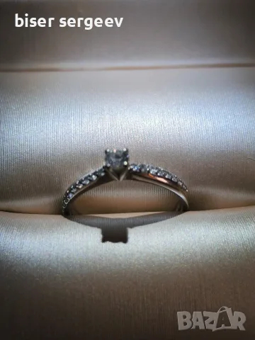 Елегантен златен пръстен с диаманти 0,31 ct (14 к.бяло злато)със сертификат.