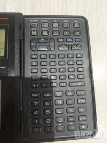 Ретро, винтидж калкулатор/органайзер Sharp IQ 7100, снимка 2 - Антикварни и старинни предмети - 53297433