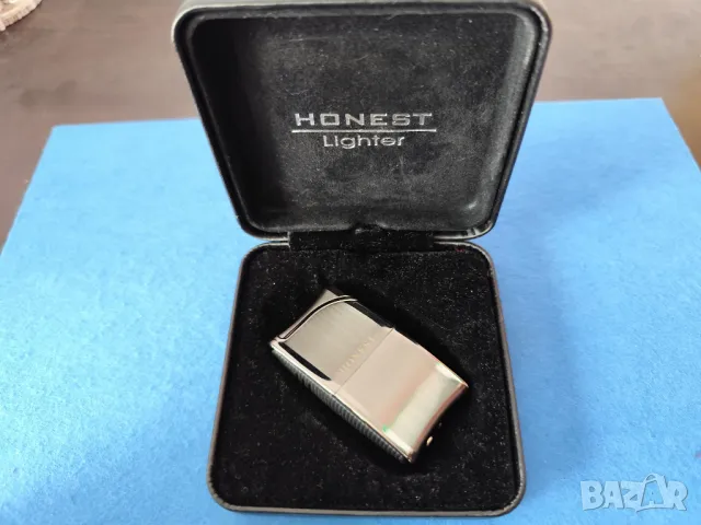 Нова противоветрова запалка Honest