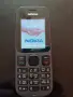 Nokia 100 със зарядно, снимка 1
