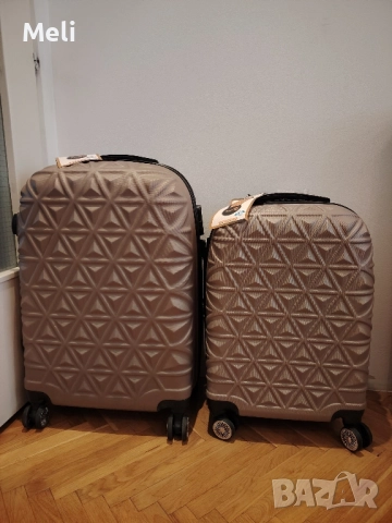 нови куфари на Reymond , снимка 2 - Куфари - 51823835