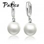 Сребърни обеци с бели перлички, снимка 1 - Бижутерийни комплекти - 29742224