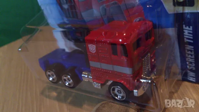 Hot Wheels Optimus Prime TRANSFORMERS, снимка 4 - Коли, камиони, мотори, писти - 50089129