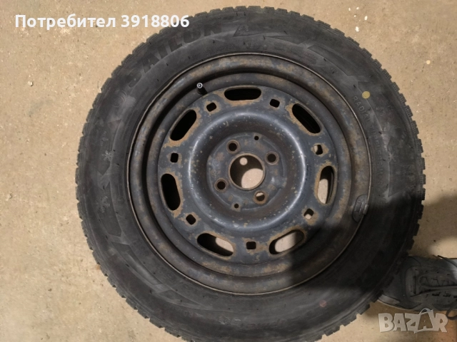 продавам 4бр.зимни гуми 185/65/14, снимка 9 - Гуми и джанти - 52376047