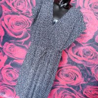 Нова Черно-бяла рокля Солей плисе под коляното 2ХЛ Намалена от 60 лв , снимка 1 - Рокли - 37747801