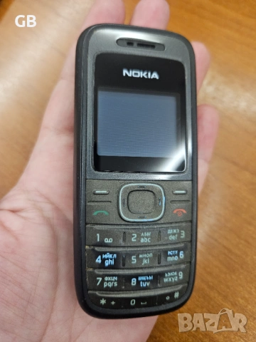 Nokia 1208 с оригинално зарядно + кожено калъфче, снимка 9 - Nokia - 50212205