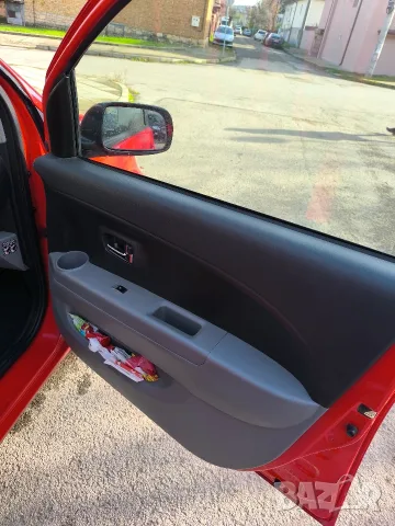 DAIHATSU SIRION 1.3/ 90ks. 2008 GAS, снимка 9 - Автомобили и джипове - 55835646