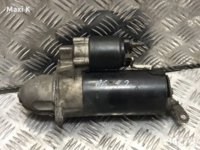 Стартер Audi A6 4.2i 2000г.