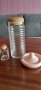 Стъклен релефен буркан с дървена капачка; керамичен капак; шише за наливен парфюм , снимка 1 - Буркани, бутилки и капачки - 42048099