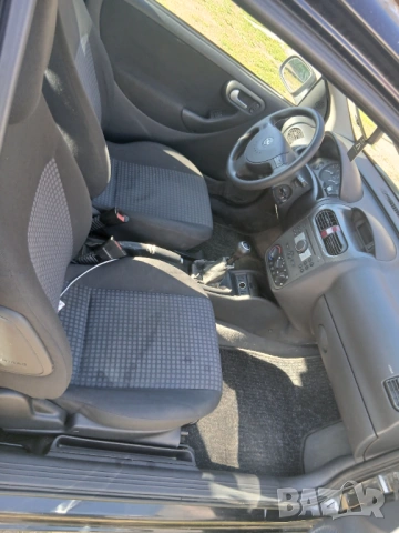 Opel corsa 1.3 2005г , снимка 4 - Автомобили и джипове - 54137746