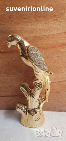 Златиста статуетка 