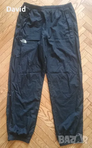 Оригинално мъжко шушляково долнище The North Face