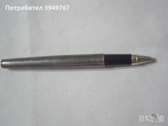 Стара сребърна химикалка.