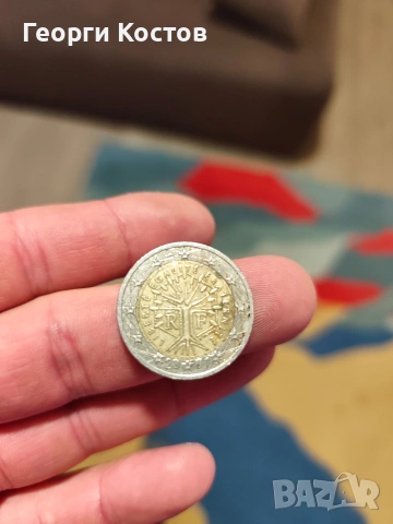 монета 2€