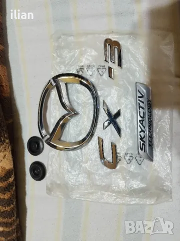 емблеми  Мазда сх 3 