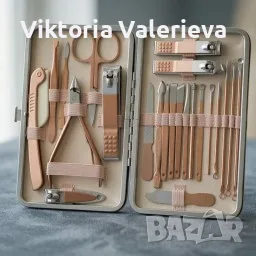 Комплект за маникюр от 23 части в златисто с елегантен калъф 