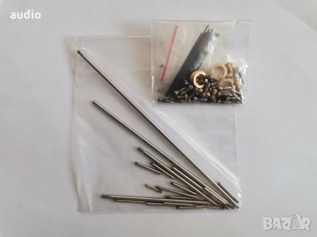 Комплект лостчета,винтове и втулки за саксофон, снимка 1