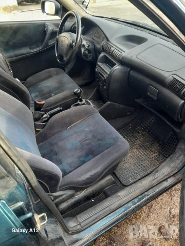 Opel Astra 1.7 TD, снимка 12 - Автомобили и джипове - 53048939