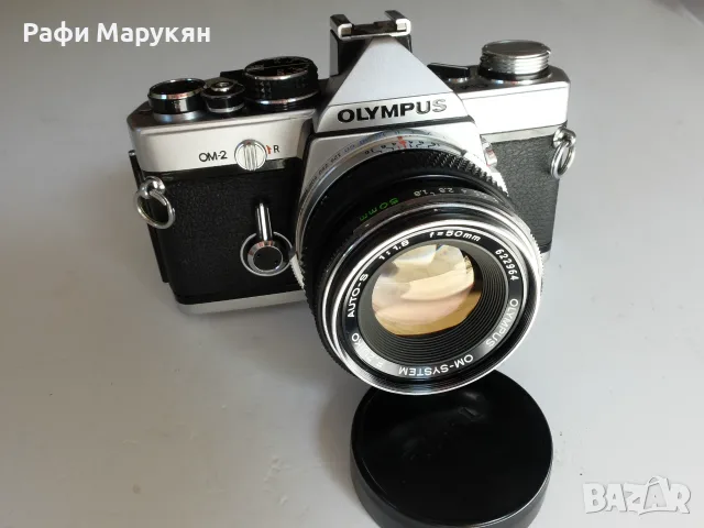 ЛЕГЕНДАРНИЯТ "OLYMPUS OM-2"- перфектен филмов комплект, снимка 2 - Фотоапарати - 55974064