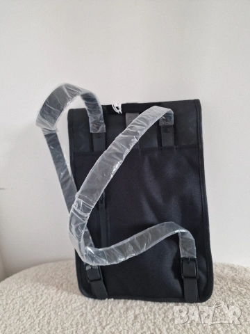 страхотна раница RAINS нова, снимка 7 - Раници - 53935068