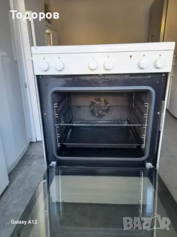 Готварска печка с керамичен плот и фурна с вентилатор Voss Electrolux, снимка 4 - Печки, фурни - 48115290