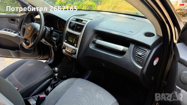 Kia Sportage 2.0, снимка 11 - Автомобили и джипове - 52245044