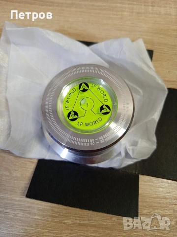 Стабилизатор за винилови плочи