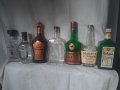 Големи стъклени бутилки от алкохол различни видове за колекция