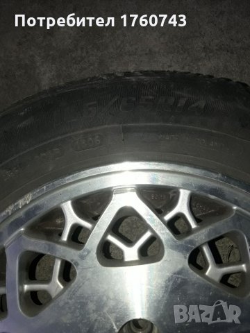 2 бр. Лети джанти 14 ц.4/100 центр отвор 61ммРЕНО Оригинални с гуми  DEBICA  185/65 /14, снимка 4 - Гуми и джанти - 33799993