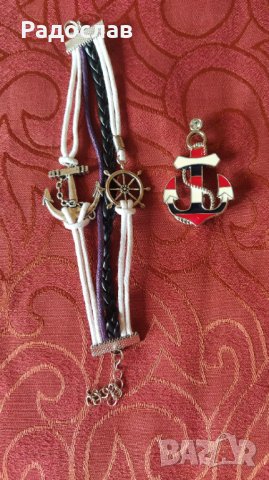 гривна и брошка Котва