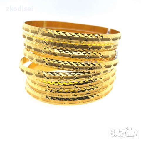 Нова златна гривна 6,70гр. диаметър:7,0см. ширина:0,5см. 14кр. проба:585 модел:219-3