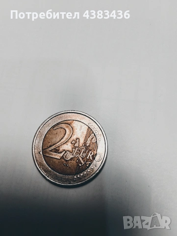 монета от 2 евро 2004г