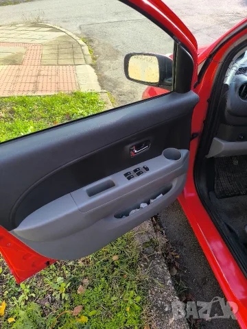 DAIHATSU SIRION 1.3/ 90ks. 2008 GAS, снимка 7 - Автомобили и джипове - 55835646