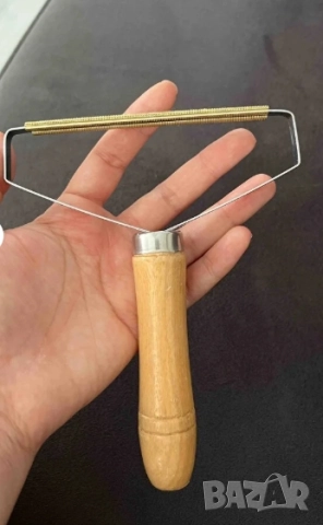  Ръчен уред за премахване на мъх и топчета от дрехи  