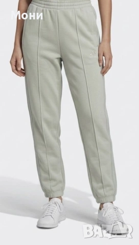 Дамско спортно долнище от Adidas в светлозелен цвят, размер S.