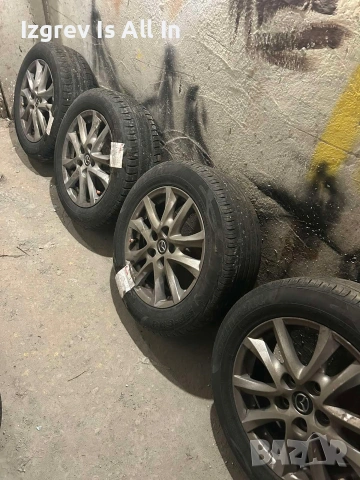 Джанти с летни гуми оригинални за Mazda 205/60/16