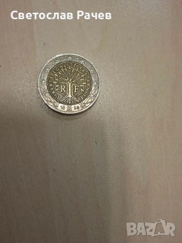 монета 2 евро