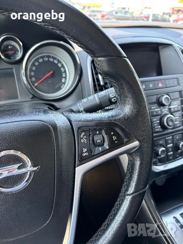 Opel Astra 2.0 CDTI, снимка 11 - Автомобили и джипове - 54218212