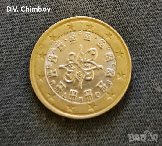 Монета от 1 евро, емисия на Португалия. На лицевата страна е изобразен гербът на Португалия