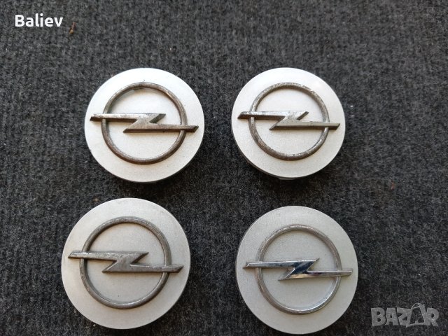 Капачки за джанти Opel 60/57мм, снимка 8 - Аксесоари и консумативи - 44443419