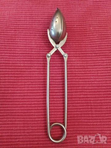 Стара лъжичка, цедка за чай. 