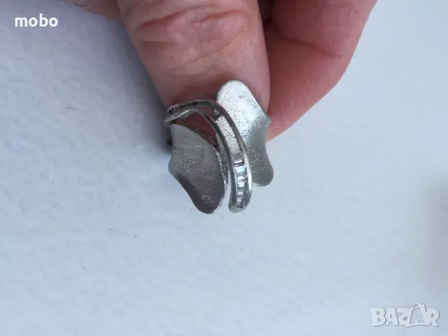 Красив нов сребърен пръстен с циркон , общо тегло 6.65г ,проба 925. 